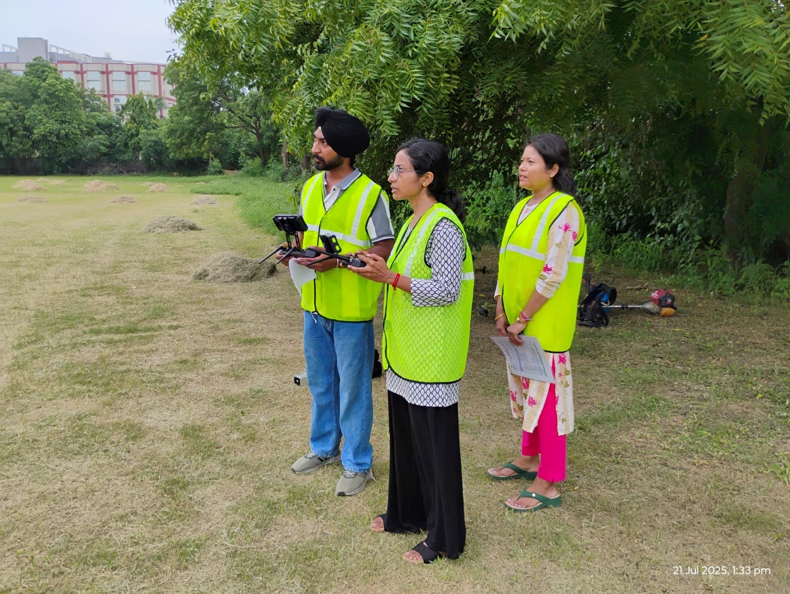 Drone pilot trainees operating controllers during an outdoor Inrec training session